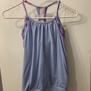 purple and pink ivivva tank top